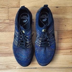 Nike women's running sneakers. Black with multi-colored threading. Size 8